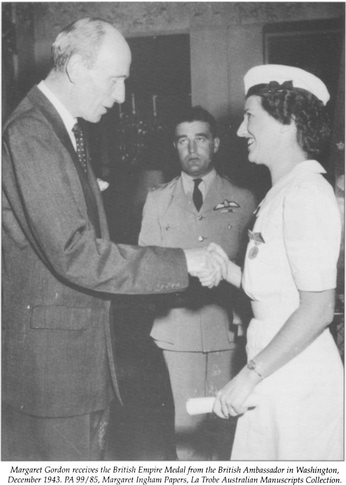 Margaret Gordon receives the British Empire Medal from the British Ambassador in Washington, December 1943. PA 99/85, Margaret Ingham Papers, La Trobe Australian Manuscripts Collection. [photograph]