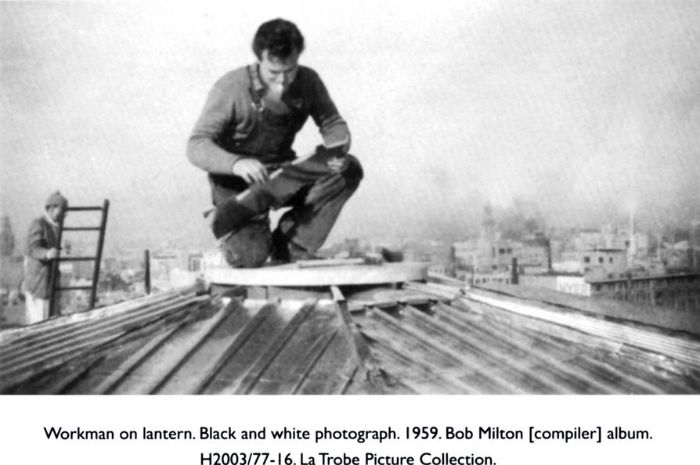 Top: Workman on lantern. Black and white photograph. 1959. Bob Milton [compiler] album. H2003/77-16. La Trobe Picture Collection. [photograph]