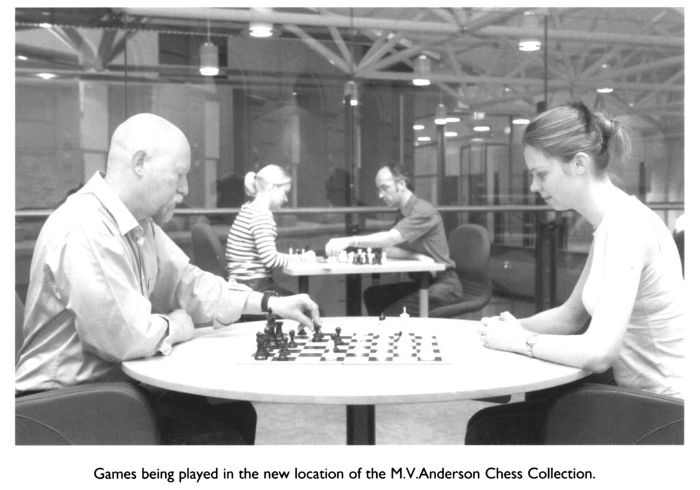 Games being played in the new location of the M.V. Anderson Chess Collection. [photograph]