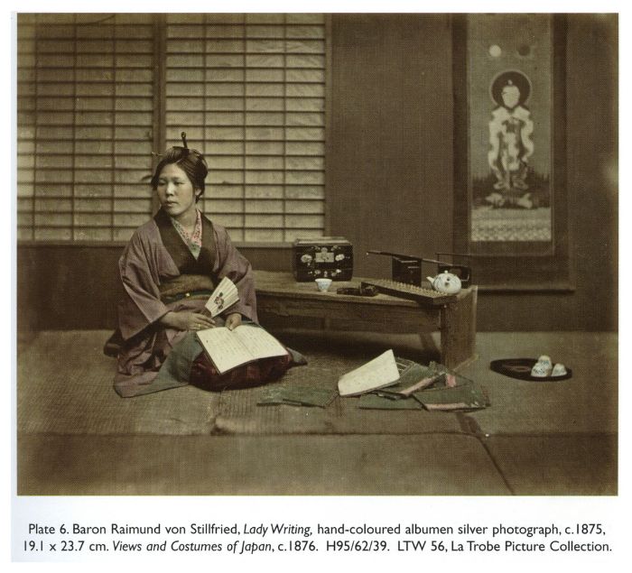 Plate 6. Baron Raimund von Stillfried, Lady Writing, hand-coloured albumen silver photograph, c. 1875, 19.1 × 23.7 cm. Views and Costumes of Japan, c. 1876. H95/62/39. LTW 56, La Trobe Picture Collection.