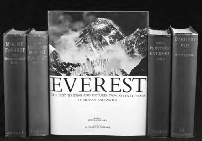 A group of books relating to Mount Everest in the Vic Spizter Collection. [five books, one with front facing with title Everest, four with spines facing]