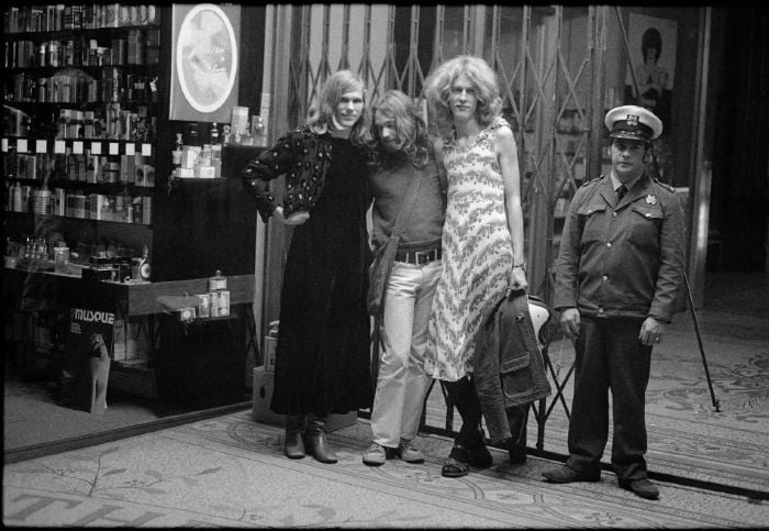 Drag Queens and Security Guard, 1973. Taken by Rennie Ellis outside the Gender Confusion Dance held at the Melburnian Receptions Basement during Gay Pride Week, and it appeared on the cover of Nation Review, vol. 3, no. 48, 14-20 September, 1973. [Photograph]