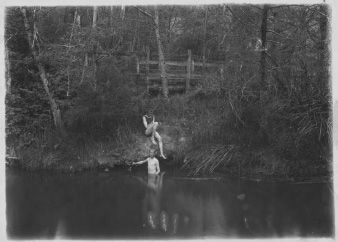 The Smith Family Album: ‘[Two children bathing from banks of creek]’. [Photo album]