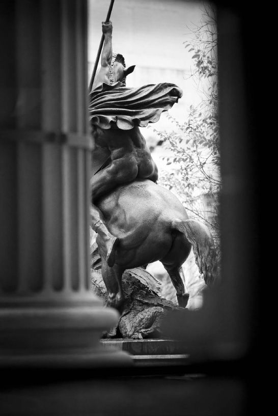 Rear view of the statue of St George in the forecourt of the State Library of Victoria. Photograph by David Marks. [Photograph, statue]