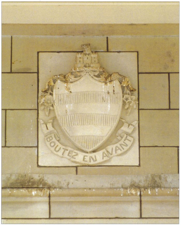 State Library of Victoria Photographic Unit. Redmond Barry's coat of arms on portico. [coat of arms on stone portico]